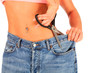 Photo: Woman cutting down to size her old jeans. Woman cutting down to size her old jeans.