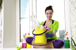 Foto: Women cleaning a window Women cleaning a window