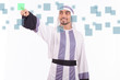 Arab businessman pressing virtual buttons