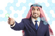 Arab man pressing virtual buttons