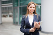 Woman holding a digital tablet