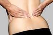 woman has her hands on back