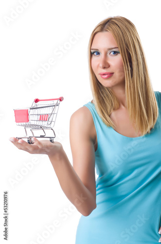 Photo: Woman with shopping cart isolated on white Woman with shopping cart isolated on white
