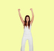 Attractive girl dressed in white on yellow