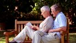 Video: Wife leaning on husband on a bench and reading a book Wife leaning on husband on a bench and reading a book