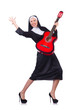 Nun playing guitar isolated on white