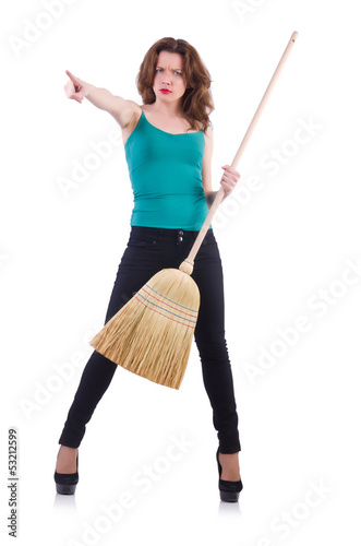 Photo: Young woman with broom isolated on white Young woman with broom isolated on white