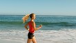 Woman running on the beach