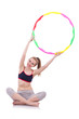 Woman doing exercises with hula hoop
