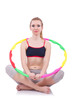 Woman doing exercises with hula hoop