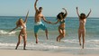 Video: Happy friends jumping on the beach Happy friends jumping on the beach