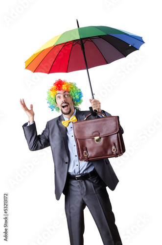 Photo: Clown businessman isolated on white Clown businessman isolated on white