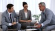Group of business people shaking hands