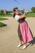 Golferin in Tracht