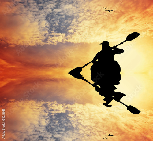 Illustration: Kayak silhouette at sunset Kayak silhouette at sunset