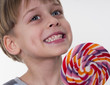 happy boy with lollipop