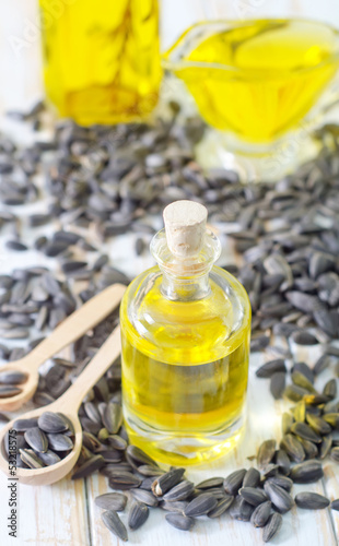 Photo: sunflower seeds and oil sunflower seeds and oil