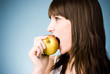 Young woman with apple