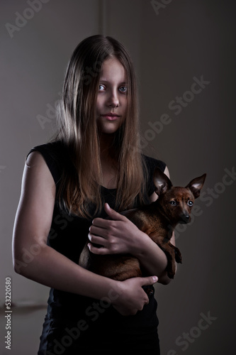 Photo: Beautiful evil teen girl with little doggy Beautiful evil teen girl with little doggy