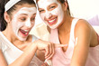 Photo: Caucasian girls wearing peeling mask having fun Caucasian girls wearing peeling mask having fun