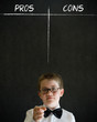 Thinking boy business man with pros and cons list