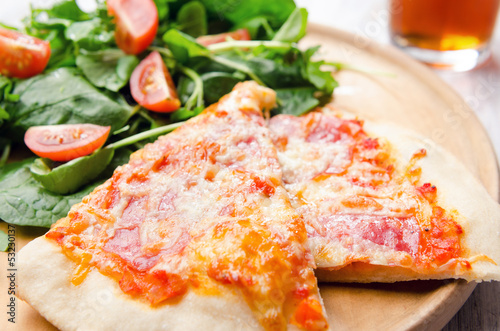Photo: Pizza and side salad Pizza and side salad
