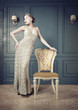 Beautiful woman retro portrait in vintage interior