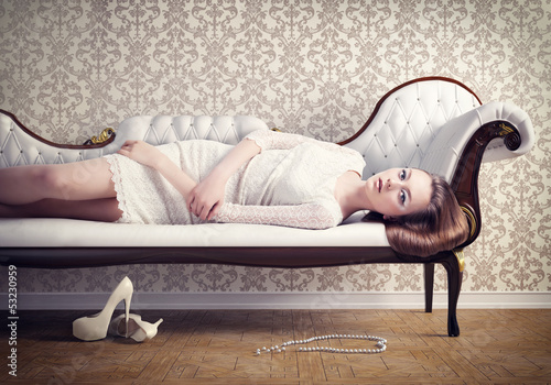 Photo: woman on a sofa woman on a sofa