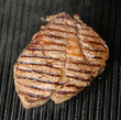 Foto: Rib-Eye Steak Cooking on Griddle Rib-Eye Steak Cooking on Griddle
