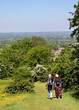 Man and woman Hikers on a track in the Cotswold Hills