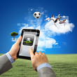 Close-up of man hands holding tablet pc
