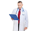 Photo: Senior doctor reading a clipboard Senior doctor reading a clipboard