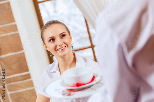 Photo: Pretty woman in cafe Pretty woman in cafe