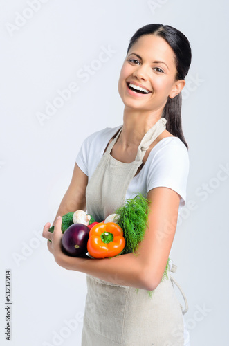 Photo: Happy healthy woman with vegetables Happy healthy woman with vegetables