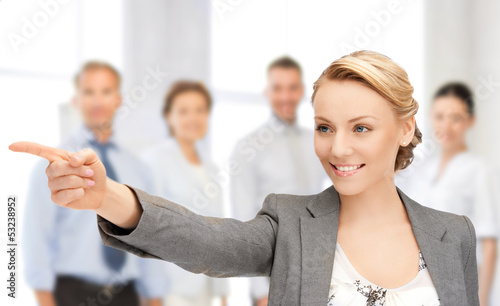 Photo: businesswoman pointing her finger businesswoman pointing her finger