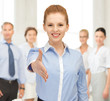 woman with an open hand ready for handshake