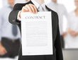 Photo: man with contract man with contract