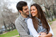 Handsome couple in park.