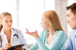 doctor with patients in cabinet