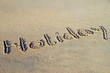 Beach and the word holiday