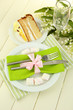 Table setting in white and green tones