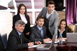Photo: Business people working in conference room Business people working in conference room