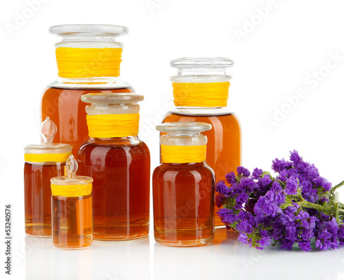 Photo: Medicine bottles isolated on white Medicine bottles isolated on white