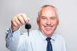 Photo: Businessman holding car key Businessman holding car key