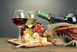 Composition with wine, blue cheese and grape