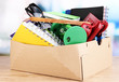Personal property in carton on table in room