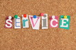 The word Service on a cork notice board