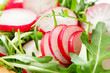 Salad greens with sliced radish