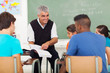 Photo: senior high school teacher teaching in classroom senior high school teacher teaching in classroom