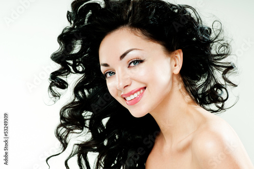 Photo: beautiful brunette with gorgeous curly hair beautiful brunette with gorgeous curly hair